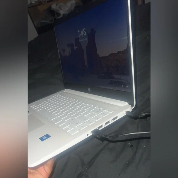 HP Silver Laptop with Black and Red Accessories